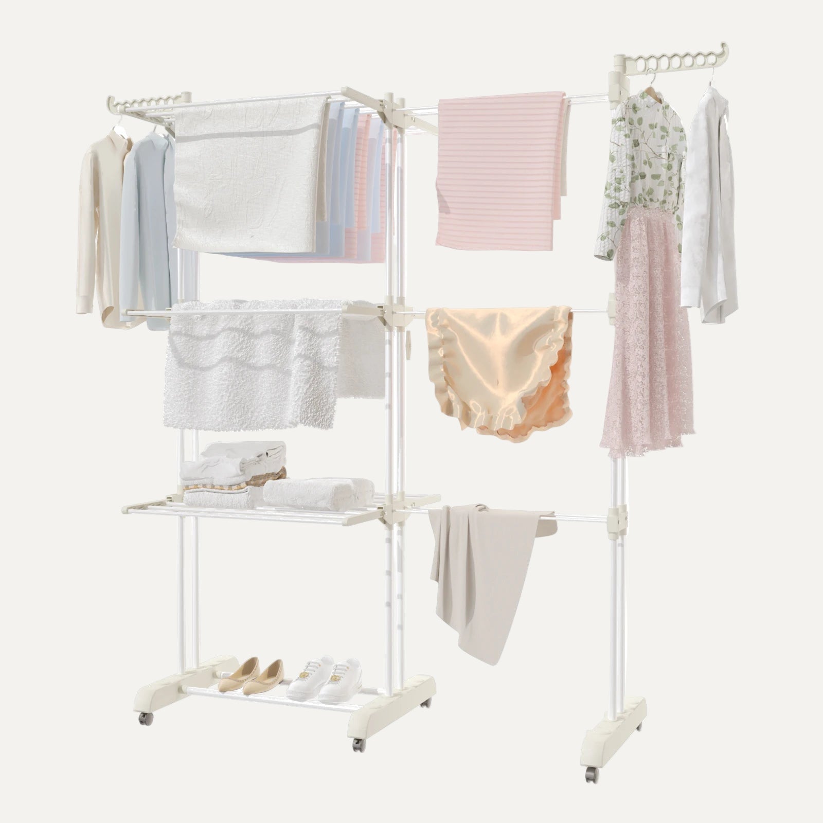 2-sided 4-tier drying rack/airer with clothes on a white background