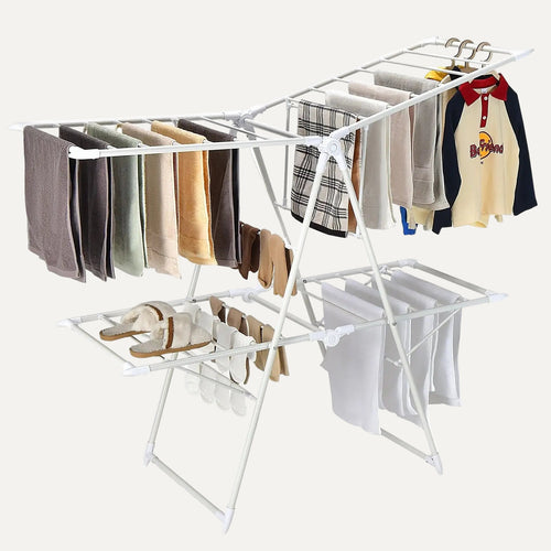 2-tier clothes drying rack/airer with various clothes on a white background