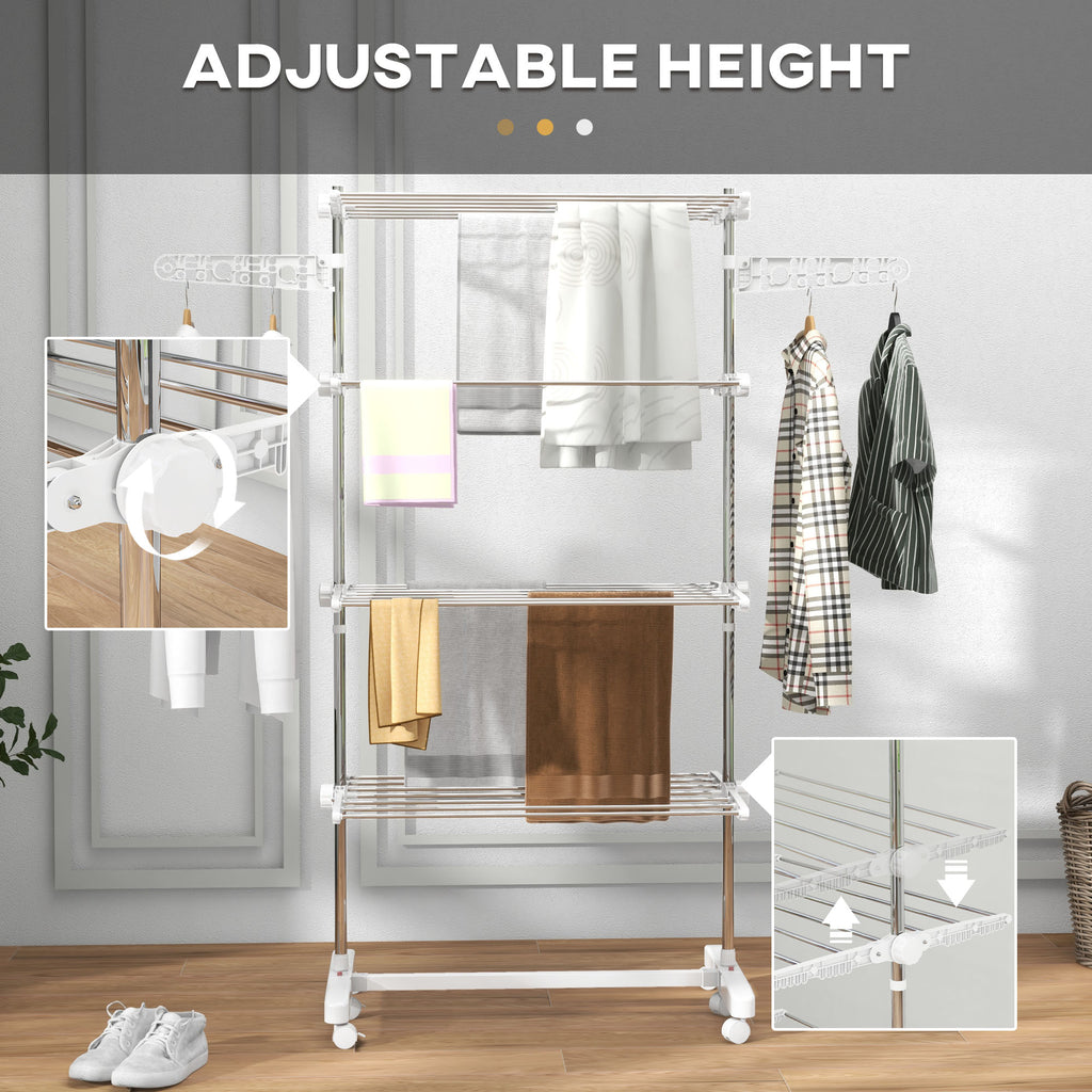Adjustable height clothing rack with clothes and towels on a wooden floor.