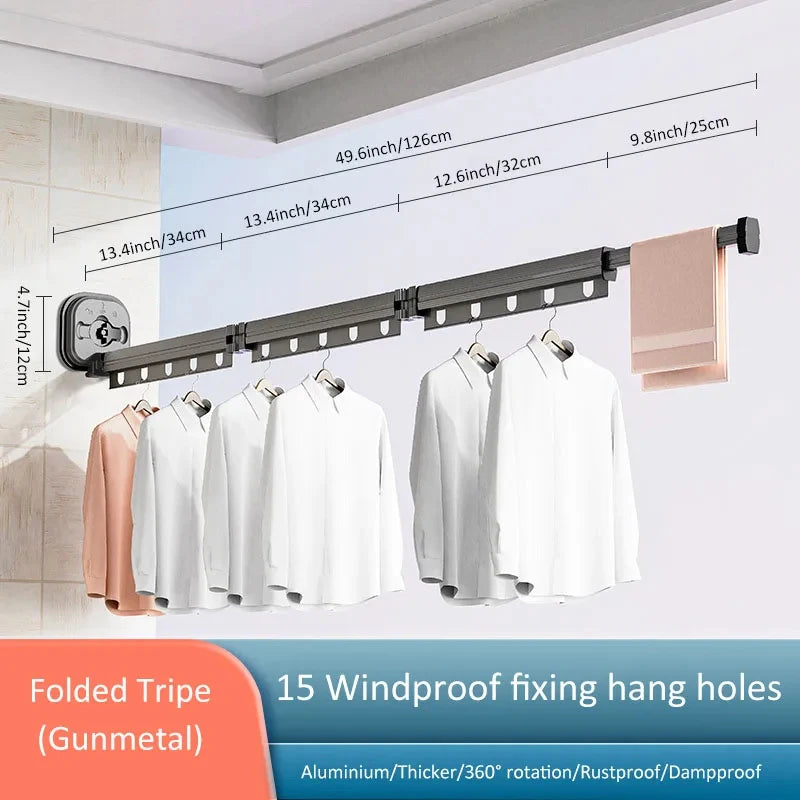 Clothes rack with measurement details and hanging clothes on a white wall.