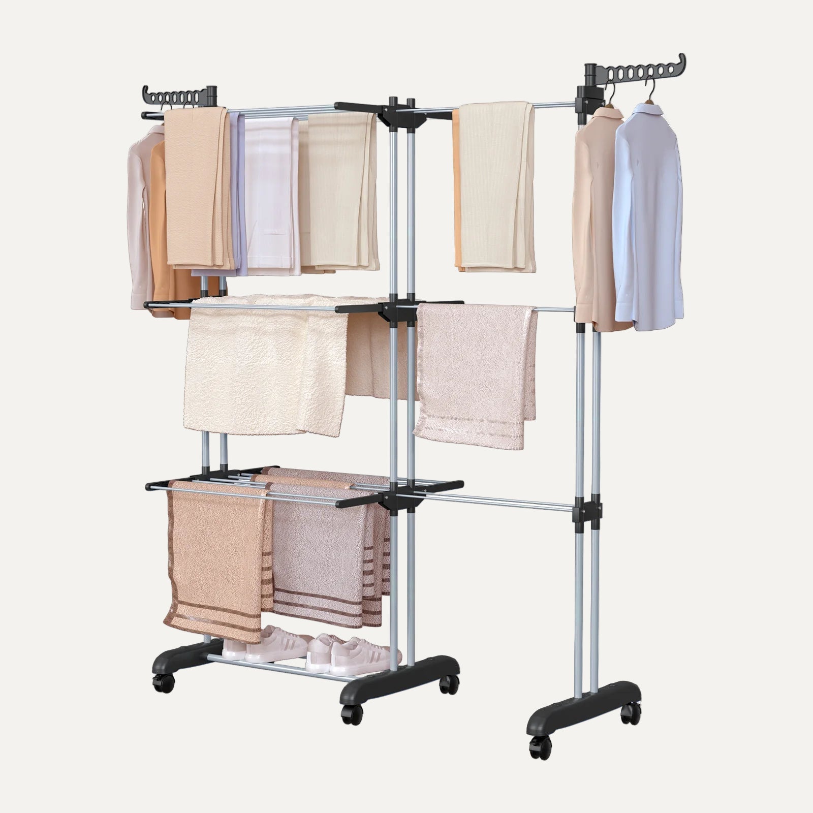 Clothing rack with multiple garments on a white background