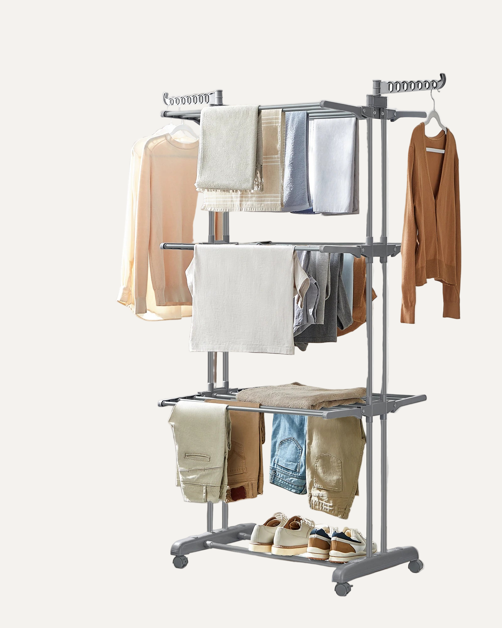 Clothing rack with various garments on a white background