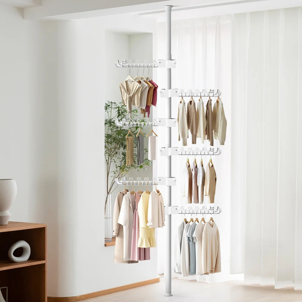 Floor to Ceiling Clothing rack with clothes and bags in a minimalistic room