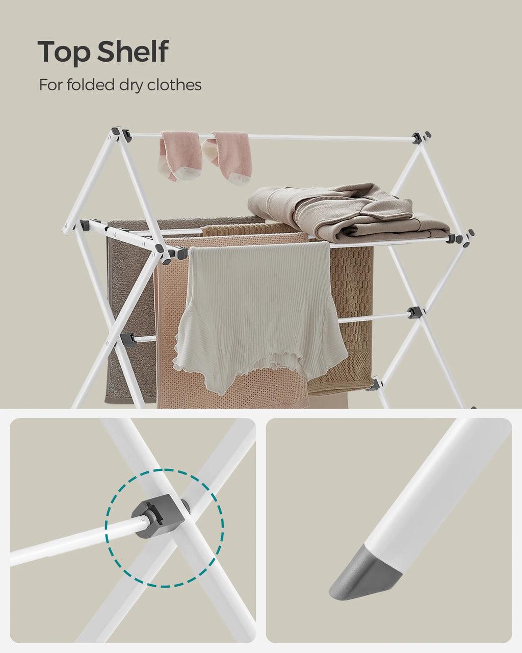 Foldable drying rack with clothes on a beige background