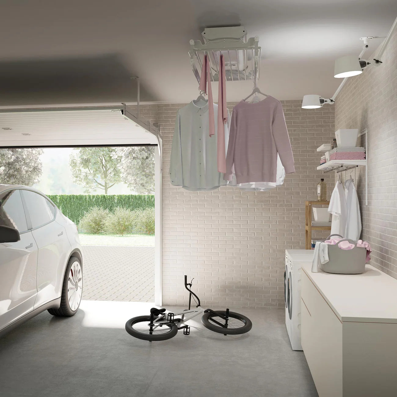 Garage with car, bicycle, and laundry hanging on a clothesline.