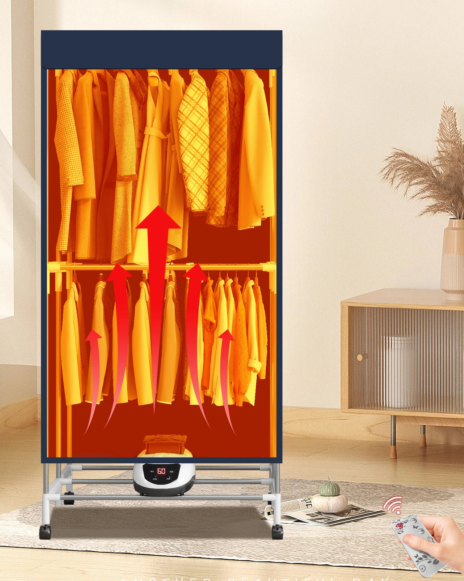 Heated clothing dryer with clothes inside, showing a hand using a remote control in a room setting.