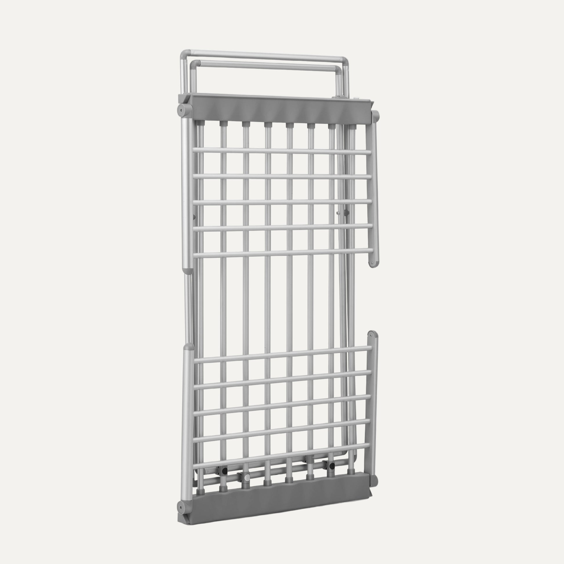 Metal grid (folded heated drying rack) with handle on a white background