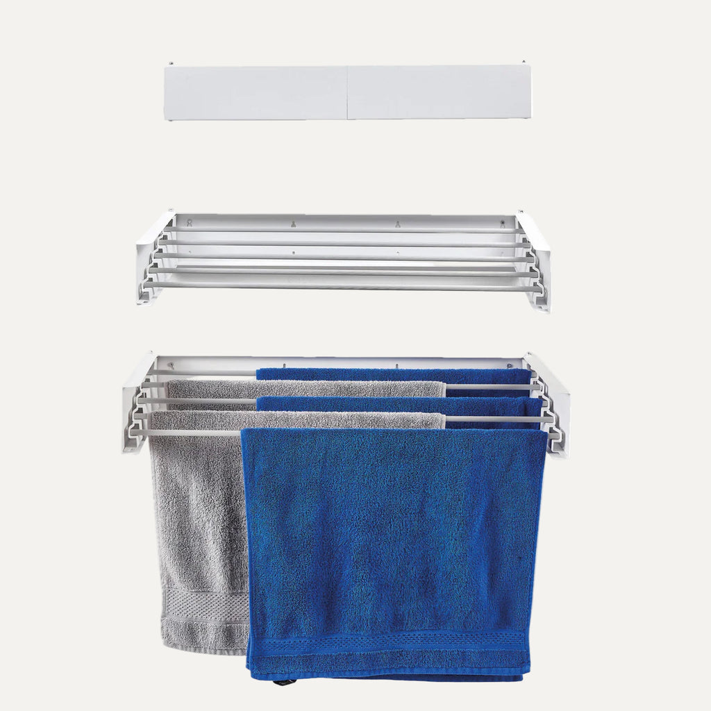 Metal towel rack/airer with blue and gray towels on a white background