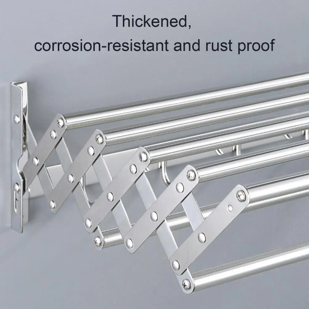 Metallic folding rack with text indicating thickness, corrosion resistance, and rust proofing on a gray background.