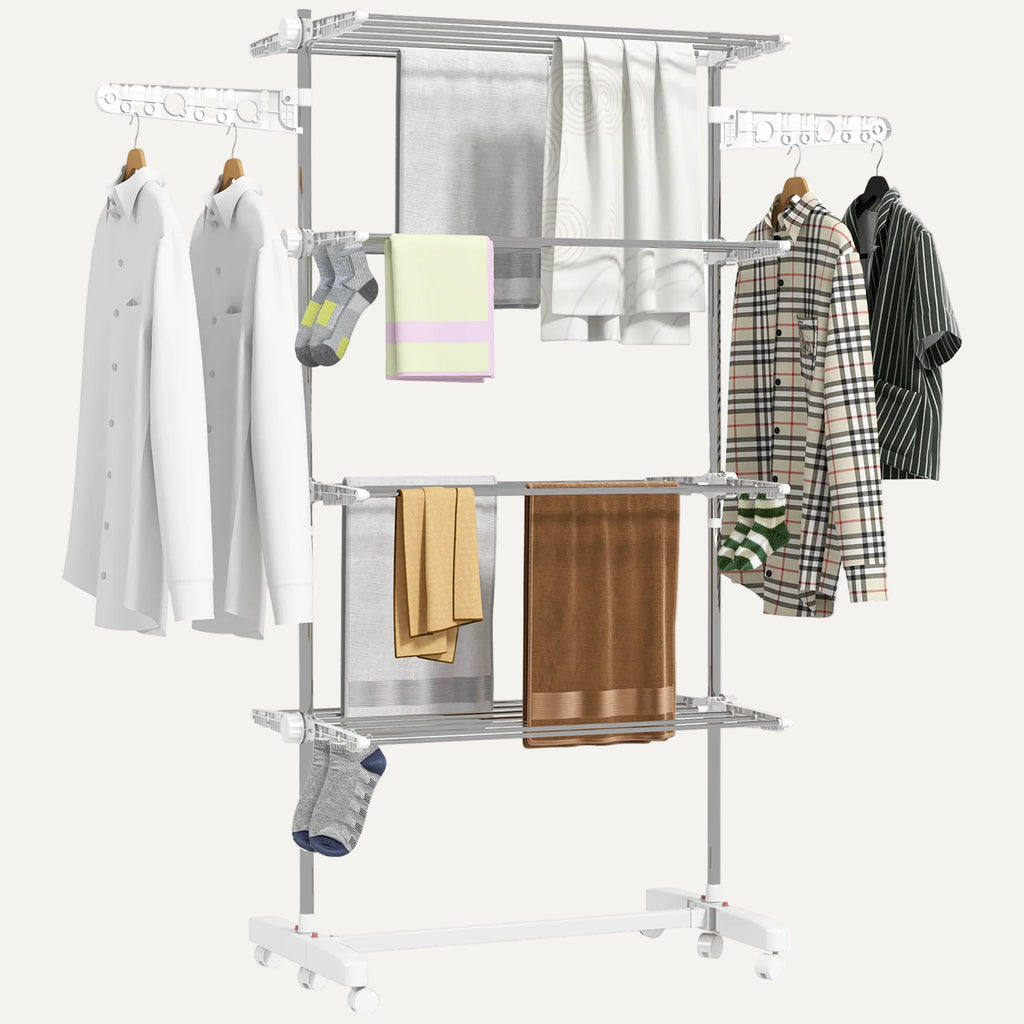 Multi-tiered clothing rack with clothes and towels on a white background