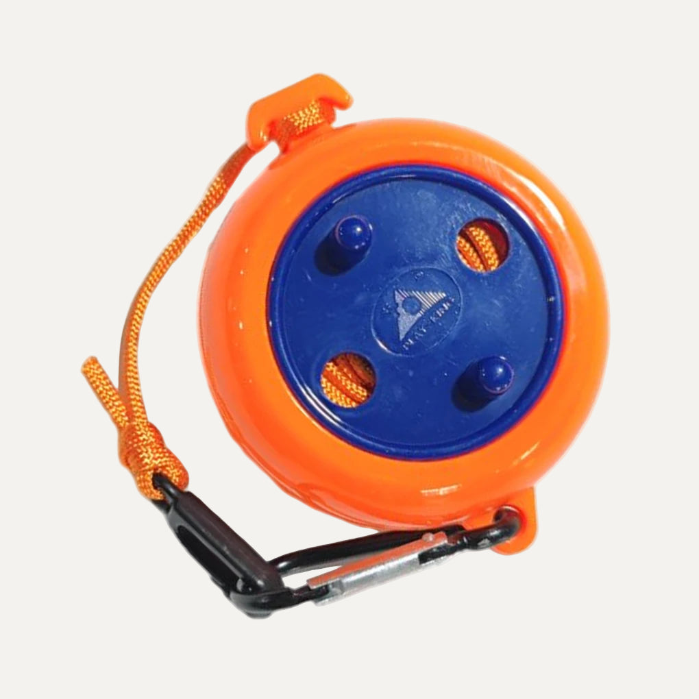 Orange and blue reel with rope and carabiner on a white background