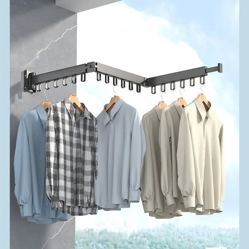 Suction Cup Clothes Drying Rack/Airer with shirts hanging on it against a light blue background