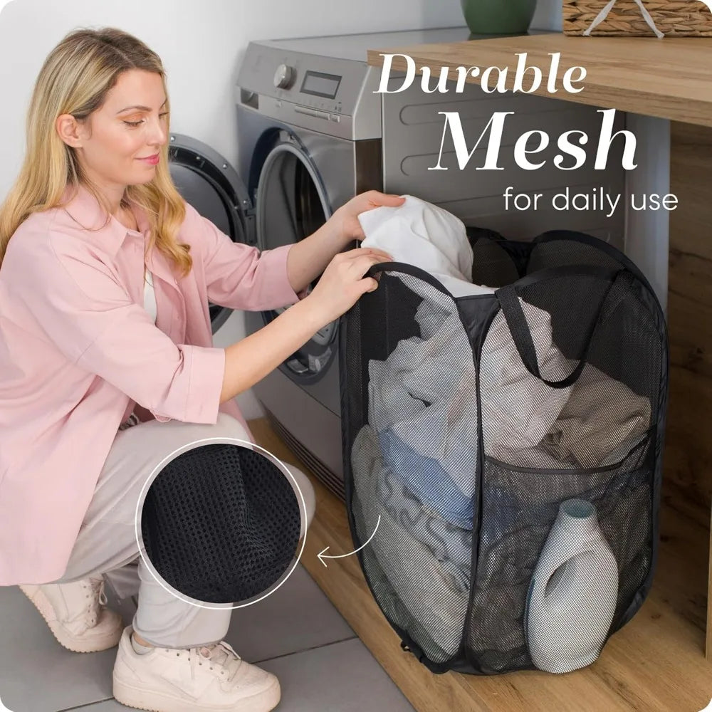Woman filling a Black mesh laundry bag with clothes near a washing machine