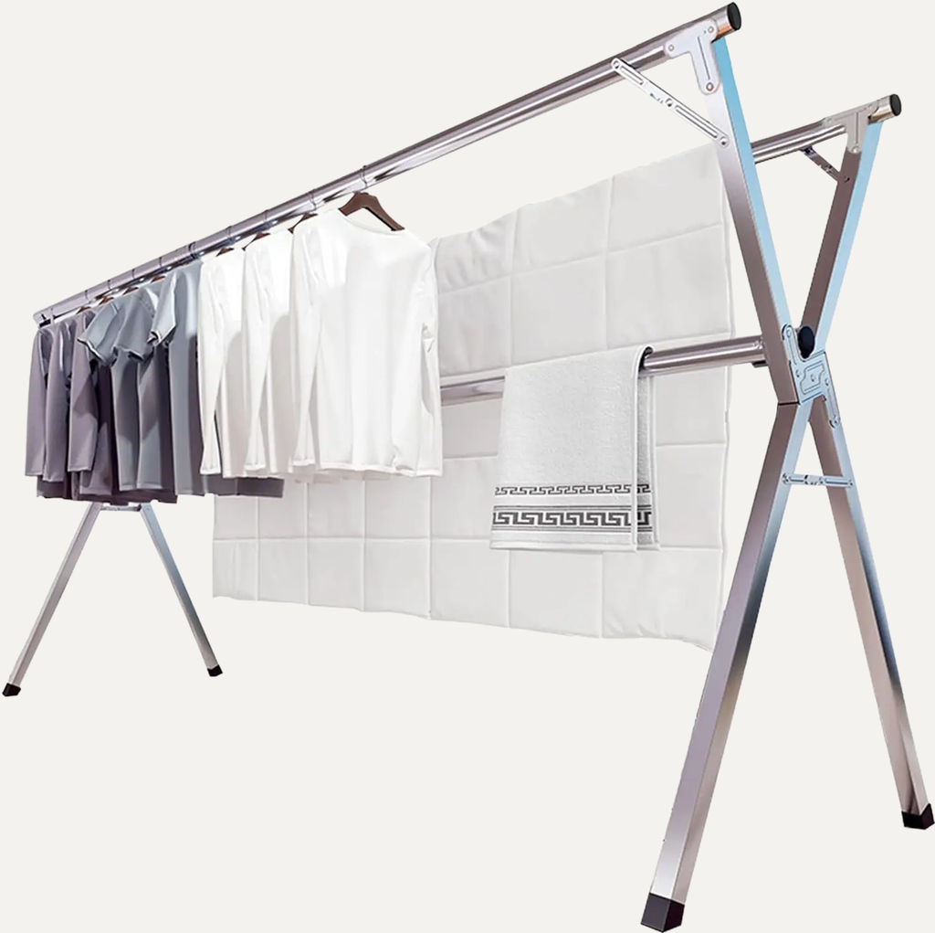 X-Shape Foldable Stainless Steel Clothes Airer/drying rack with clothes on a white background