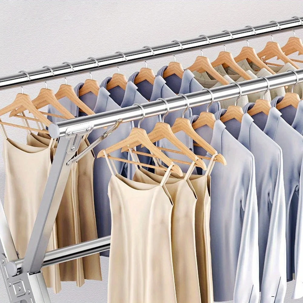 X-Shape Foldable Stainless Steel Clothes Airer/drying rack with clothes on it