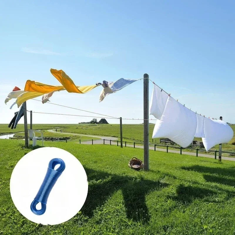 garments and white sheets outside hanging on a clothes line rope